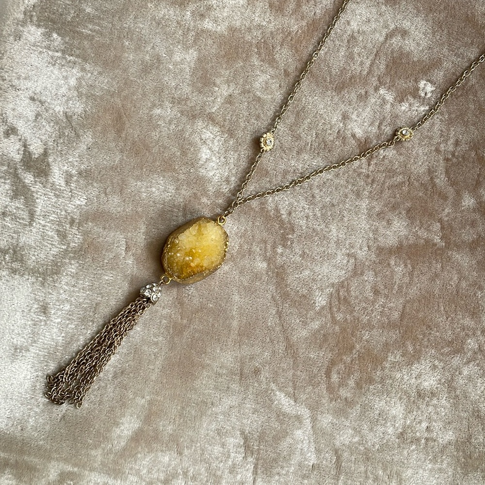 Yellow crystal costume jewelry with tassel